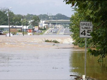 Ariel View of Veterans Memorial Highway - Spectators on the Railroad Track Looking at the Flooding